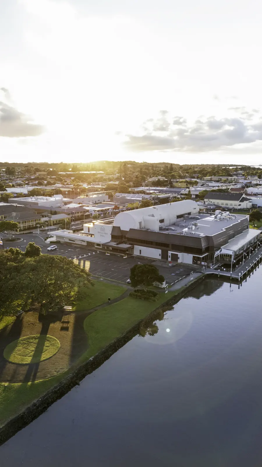 Sunset aerial of Ballina RSL on the riverbank