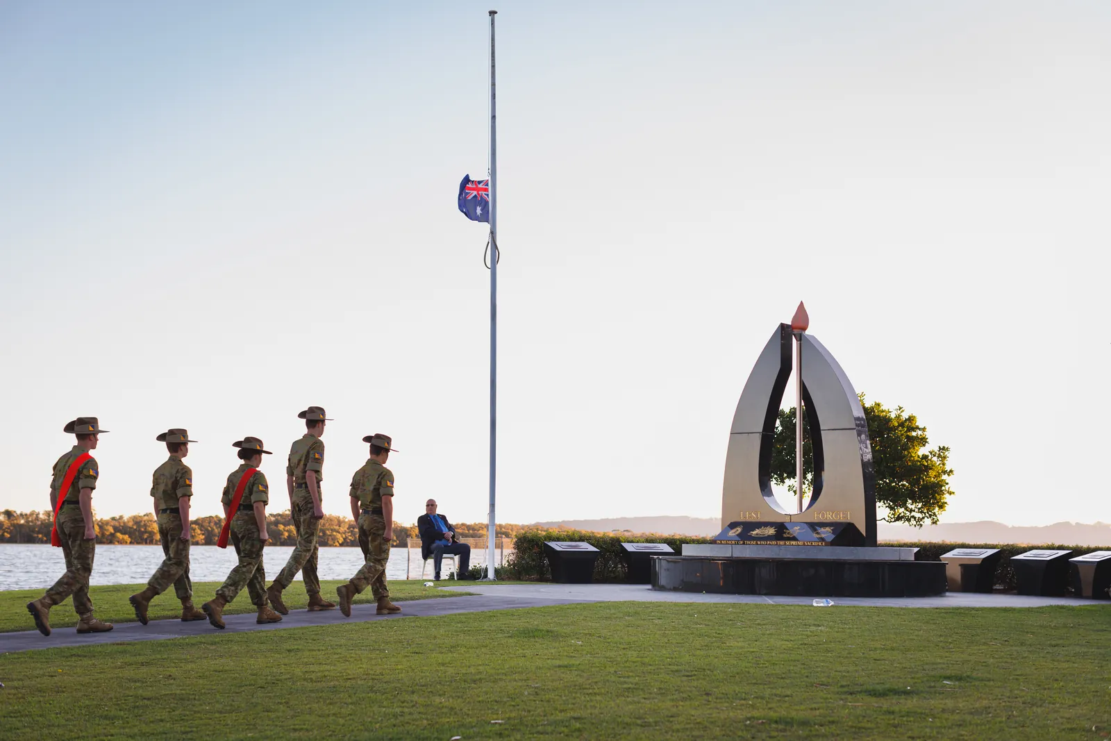 Army cadets marching past the waterfront memorial at Ballina RSL's Vietnam Veterans Day service